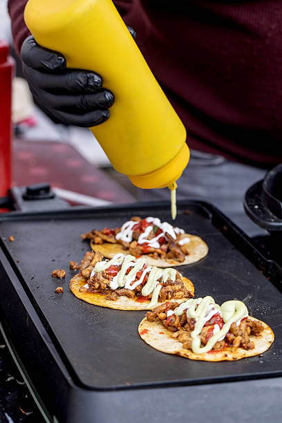 istock Street Food Tacos with Squeeze Sauce 2210986347