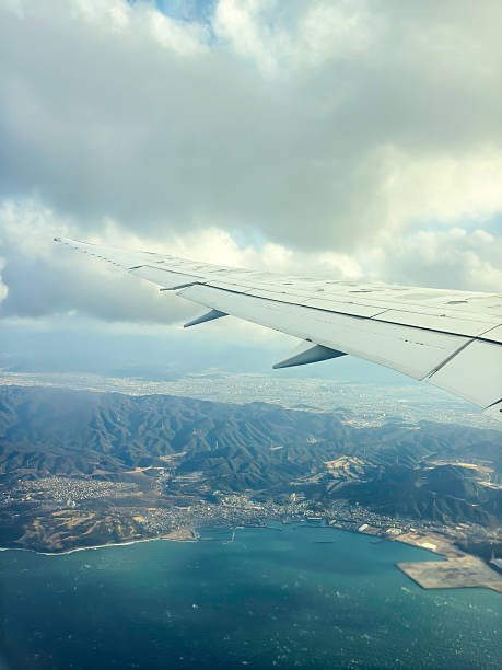 istock Ariel View of the Sky from the Plane Window 2210991524