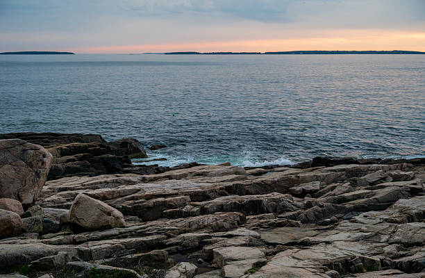 istock Shallow Teal Water Splashed On The Rocky Coast Of Acadia 2210995472