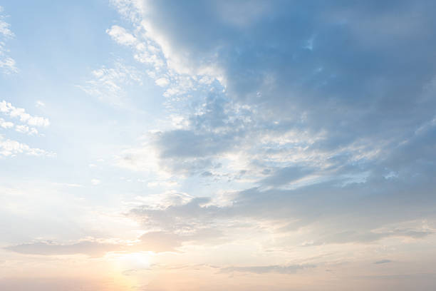 istock Serene Sunset Sky with Soft Cloudscape Peaceful and Calm Evening Atmosphere 2210995742