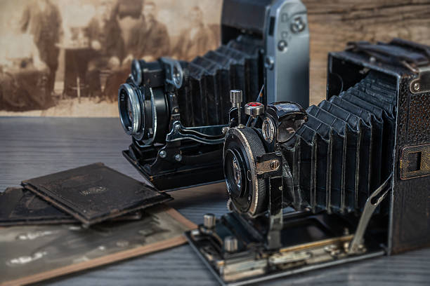 istock Vintage cameras and old photographs create a nostalgic atmosphere in a cozy workspace 2210997420