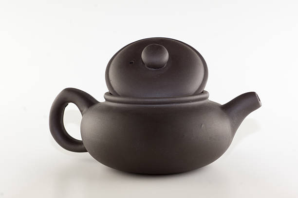 yixing clay tea accessories isolated on white background