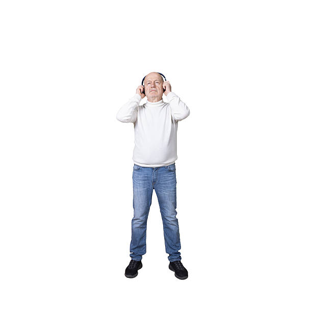 a man standing with a pair of headphones on his ears on a transparent background