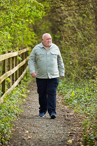 istock Burly and unshaven man out for a walk 2211003331