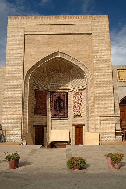 istock Beautiful historic archway with carpets displayed in an ancient city setting 2211024892