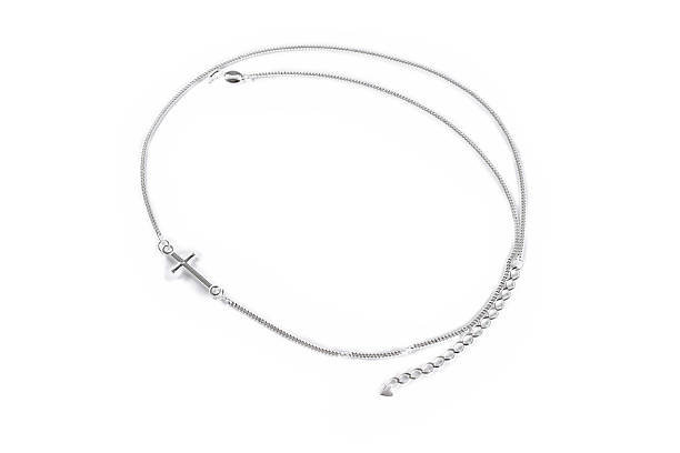 istock Sleek silver chain with a simple cross pendant displayed on a clean white background. Ideal for religious gifts, daily wear, and minimalist fashion, symbolizing faith and devotion. 2211026734