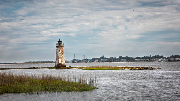 istock Scenic Coastal View Featuring a Historic Lighthouse 2211027236