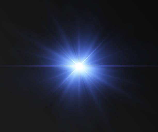 istock A vibrant image of a bright blue light source shining at the center, radiating dynamic beams against a dark background. This striking glow evokes a sense of clarity and depth, ideal for various design 2211028007