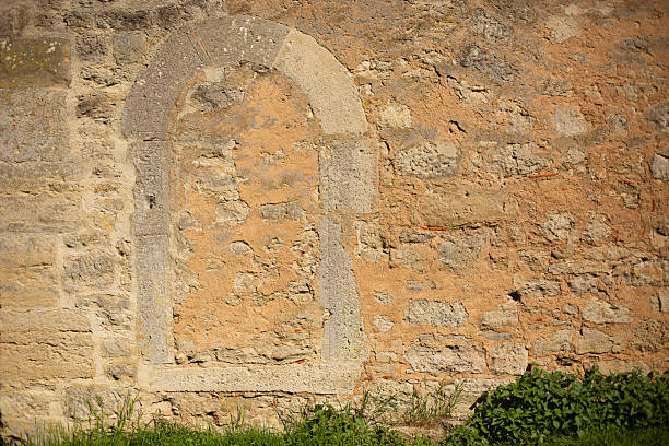 istock Historic Stone Wall with Sealed Archway 2211029001