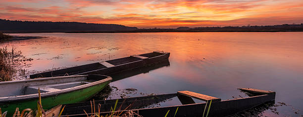 istock Beautiful sunrise over the lake 2211031019