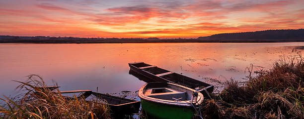 istock Beautiful sunrise over the lake 2211031025
