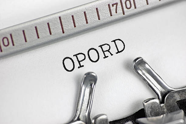 istock Operation order acronym OPORD text macro closeup, typewriter typed leader directive to subordinates, coordinated military combat mission execution concept, large detailed horizontal retro document metaphor 2211037671