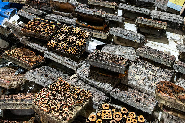 istock Traditional batik copper stamps displayed on table 2211052116