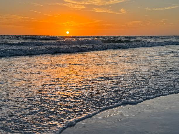 istock Sunset over Crescent Beach in Sarasota, Florida 2211057051