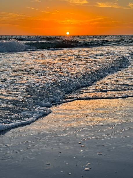 istock Sunset over Crescent Beach in Sarasota, Florida 2211057053