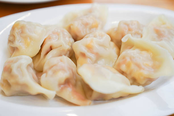 istock Close up of fresh boiled dumplings 2211063677