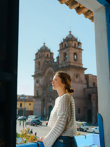 istock Woman looking at Plaza de Armas in Cusco, Peru from balcony 2211066303