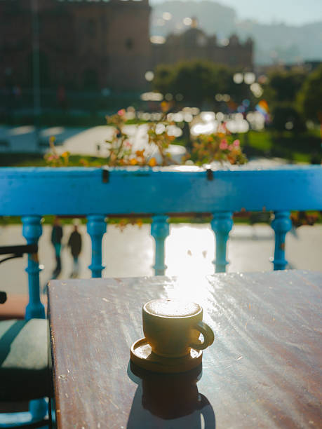 Coffee on table with view of Plaza de Armas in Cusco  during experiential trip to Peru