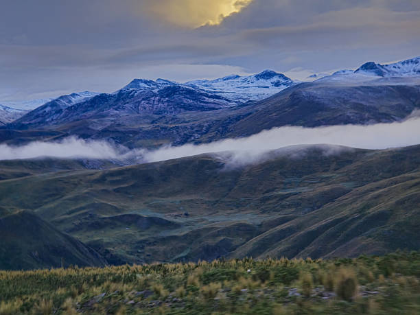 High Andean landscapes with meadows, clouds and fog.