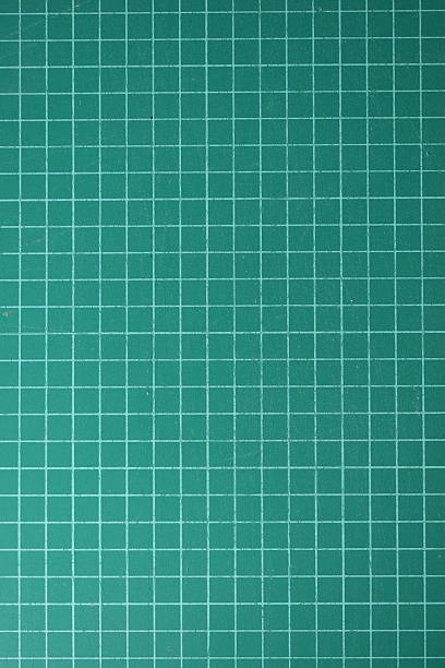 istock green cutting mat board background with line and scale measure guide pattern for object art design, tool equipment of diy craft work 2211081548