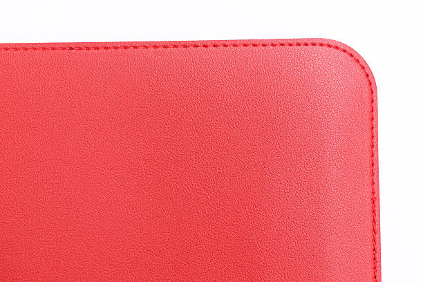istock shiny red leather texture isolated on white background 2211081689