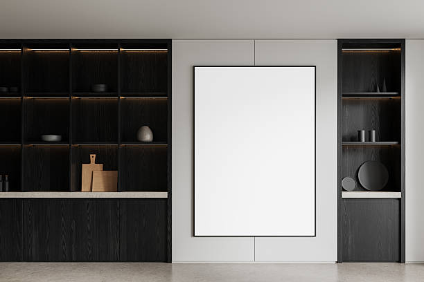 istock Minimalist blank poster on modern kitchen wall with dark wood shelves and decorative objects, clean layout for design presentation mockup. 3D Rendering 2211085278