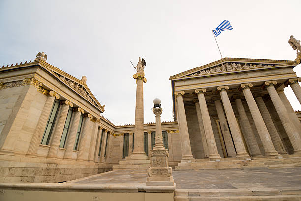 Academy of Athens, on the sides of which are two Ionic columns with statues of Athena and Apollo