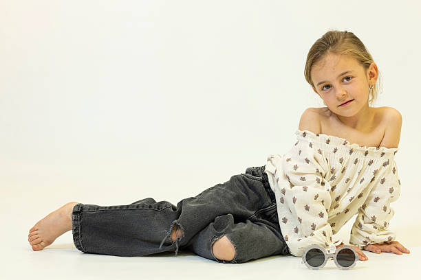 istock Happy caucasian children posing and playing in commercial studio with copy space 2211088492