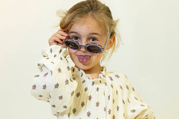 istock Happy caucasian children posing and playing in commercial studio with copy space 2211088581
