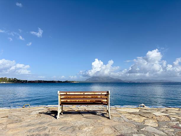 Park benches on the edge of the sea