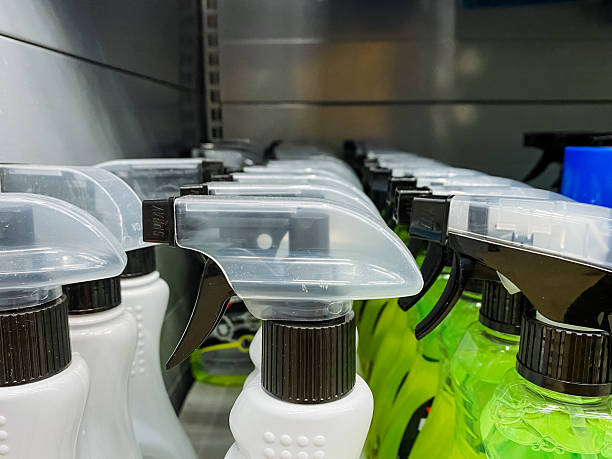istock A neat row of various spray bottles is meticulously lined up on a shelf, showcasing an array of colorful fluids ready for use in different applications and purposes, emphasizing cleanliness 2211090289