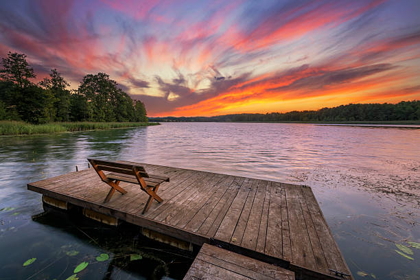 istock Beautiful summer sunrise over the lake 2211090899