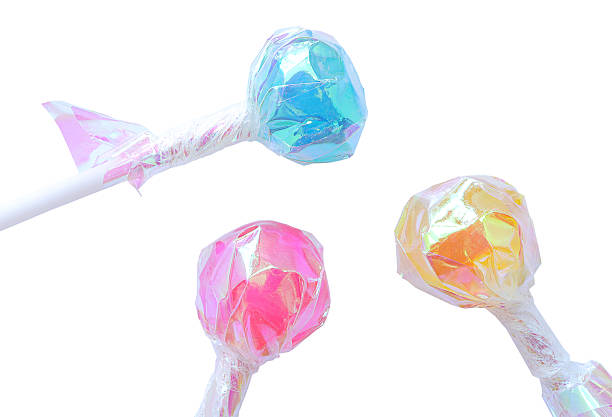 Different lollipops on a white background with clipping path. Colorful round sweet lollipops on white.