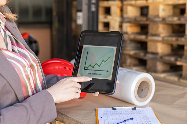 istock Businesswoman review growth on tablet 2211093665