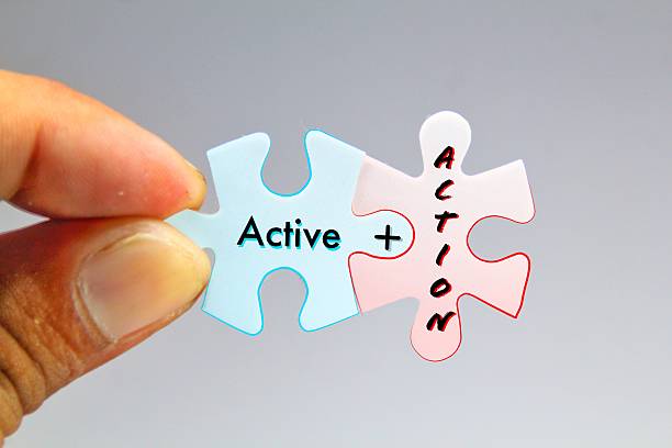 istock ACTIVE plus Action word alphabet letters on puzzle. characterized by action rather than by contemplation or speculation 2211098189