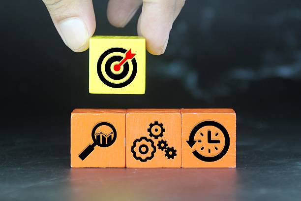 istock Colored cubes with target business icons 2211098576