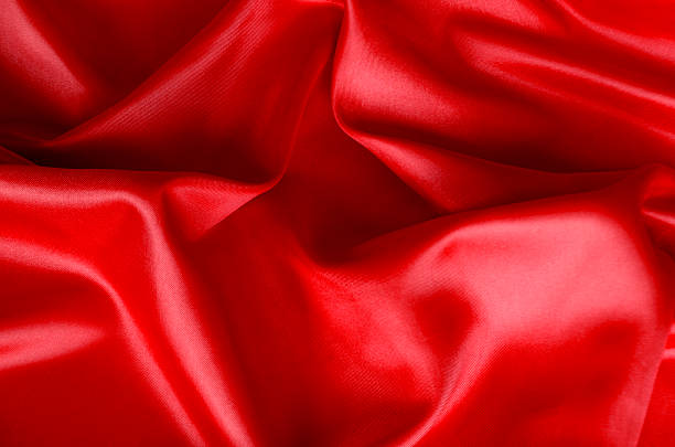 istock Bright and lustrous dark red fabric showing smooth texture. Suitable for design and wallpaper background 2211101205