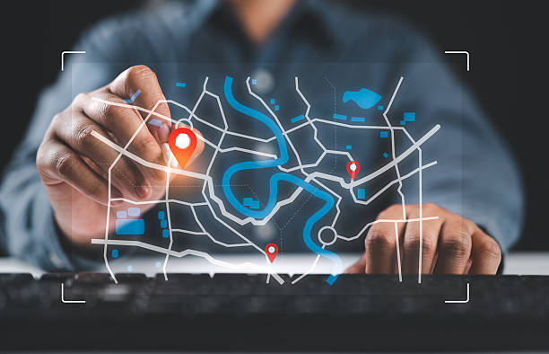istock Businessman marking location pin points and search addresses on geolocation map application. Synchronize destination for travel or finding business places in GPS Satellite coordinates system on web. 2211104082