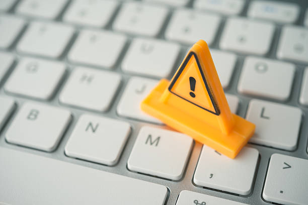 istock Maintenance, repair, under construction in computer system from virus or ransomware concept. 2211110673