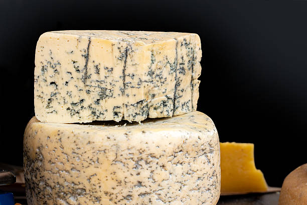 istock Blue cheese chunks on display at farmers market 2211111963