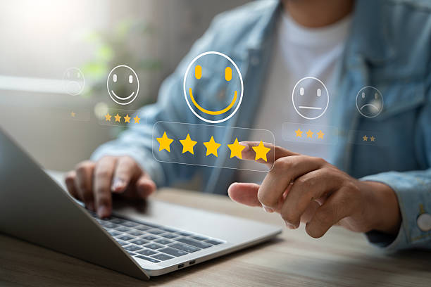 istock Customer satisfaction survey concept, Man using laptop touch happy smiley icon, 5 star service experience rating, Feedback, Online review, Online application, Quality satisfaction review. 2211118921
