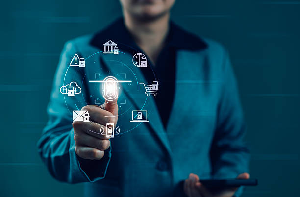 istock Biometric authentication and fingerprint access system concept. Woman scanning fingerprint, representing secured data access, cloud protection, and cybersecurity technology for identity verification. 2211120872