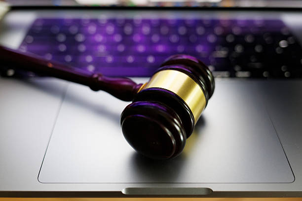 istock Judge gavel of justice on laptop computer keyboard 2211121605