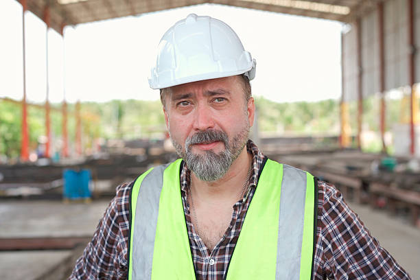 istock Portrait of civil engineer portrait in construction site. 2211122943
