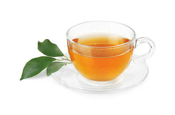 istock Refreshing green tea in cup and leaves isolated on white 2211125213