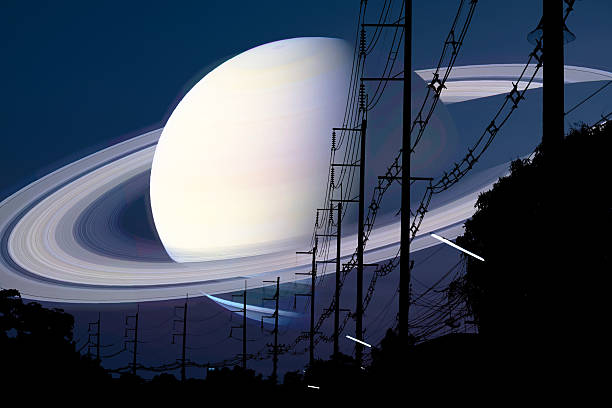 A stunning blend of celestial beauty featuring Saturn with its iconic rings looming over an urban landscape with power lines. A striking night sky evokes wonder.