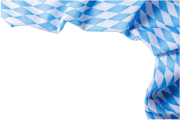 istock Empty Beer Fest white and blue checkered tablecloth isolated on white background 2211135081