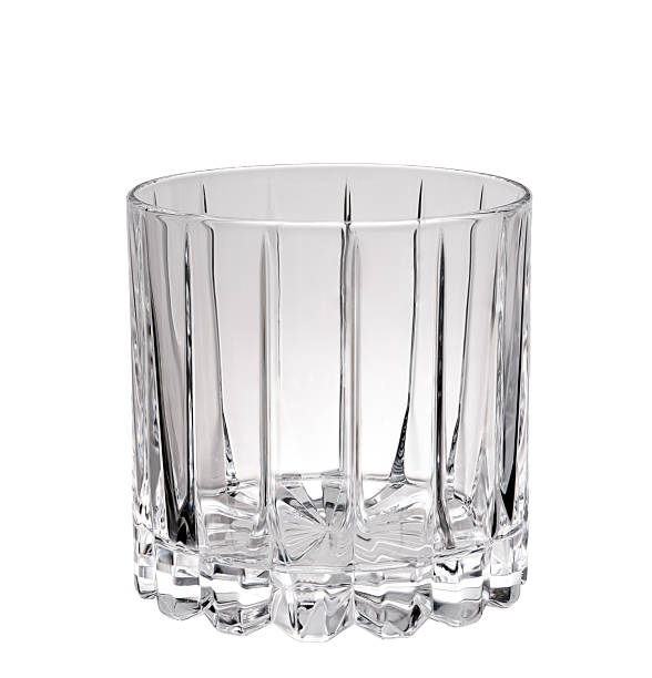 istock Empty and clean whiskey glass isolated on white background 2211138530