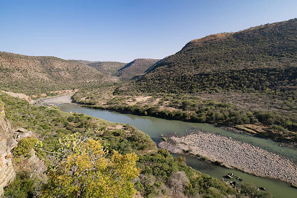 istock River Winding Through Mountain Valley Landscape 2211138577