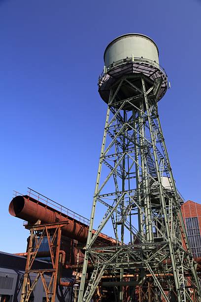 istock Factory water tower in Germany 2211138906